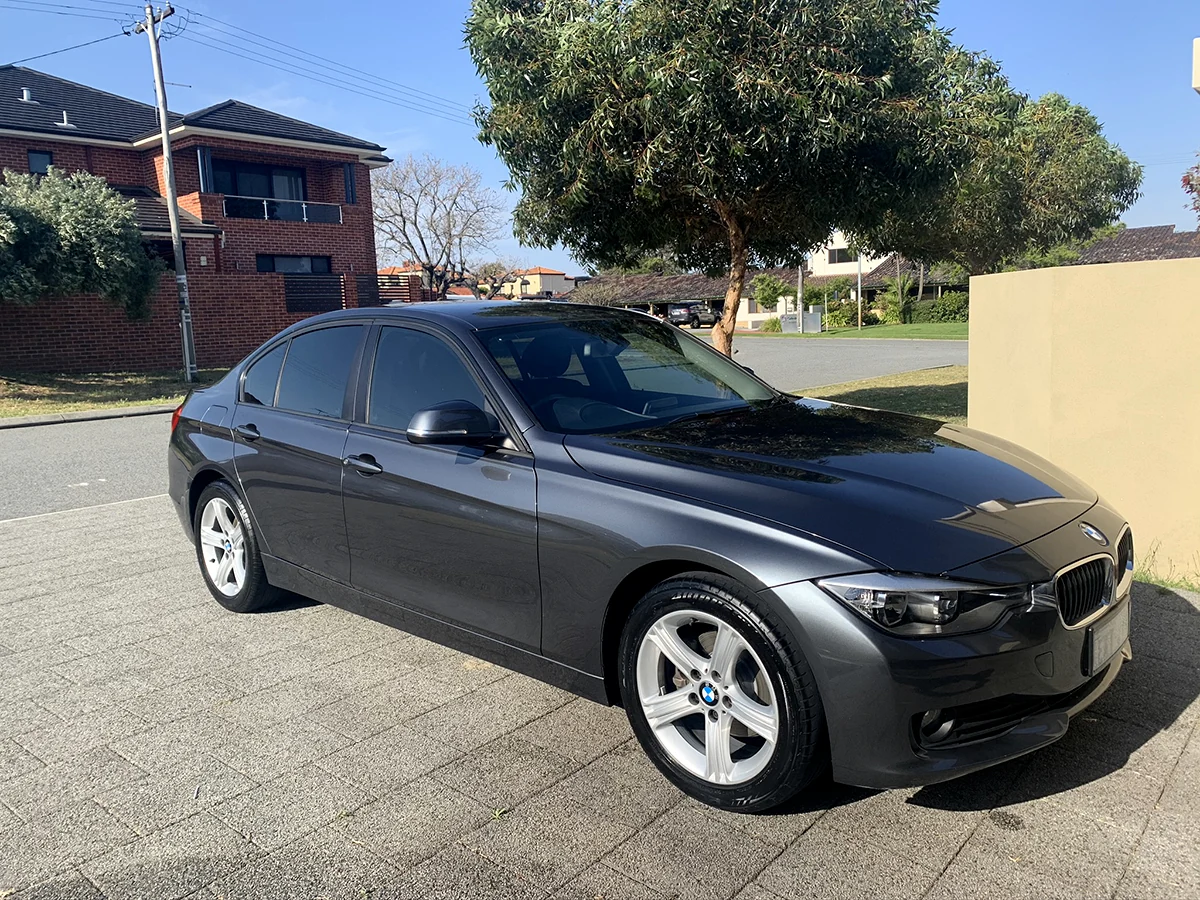 Dark BMW with clean glossy bodywork